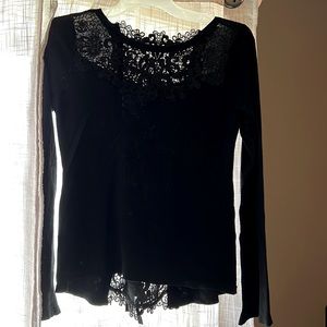 Lightweight sweater with sheer lace and 4 ties down the back lace detail.